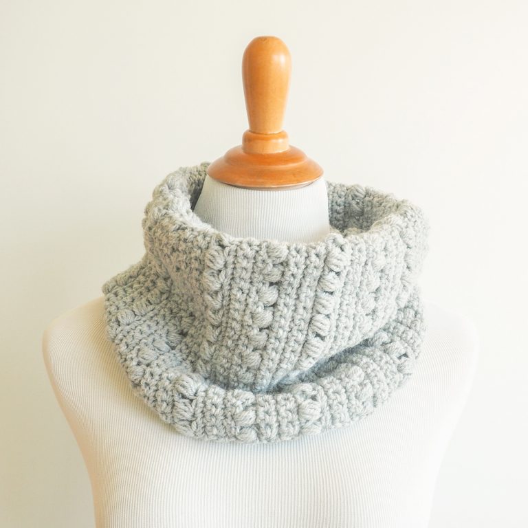 19 Easy Winter Crochet Cowls to Keep You Warm - here's a list of the coziest, stylish crochet cowls and infinity scarf crochet patterns to wear this season. #crochetcowl #crochetpattern #crochetinfinityscarf #cozycrochet