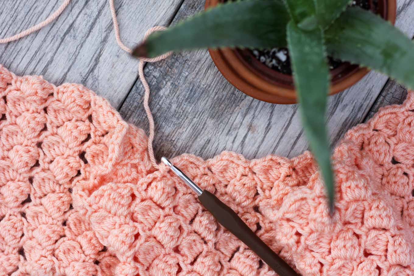 Side Saddle Stitch - These different basic crochet stitches are the fundamentals to becoming an inventive crocheter. You could use these crochet stitches for blankets or a multitude of other projects. #SingleCrochetStitch #TunisianCrochet #BasicCrrochetStitches