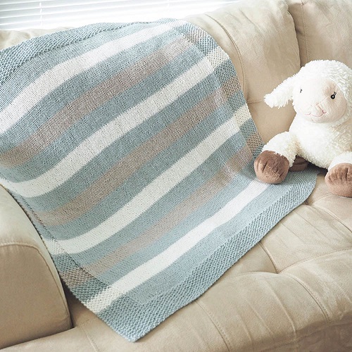Striped Baby Blanket - These knitting patterns are fun and diverse. There are so many options to choose from and most of them make great easy knitting projects for beginners. #KnittingPatterns #EasyKnittingProjects