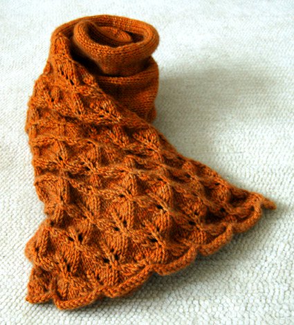 Lovely Leaf Lace Scarf - We’ve gathered here 21 cozy scarf knitting patterns that you can knit quickly, just in time for fall and impending winter. #ScarfKnittingPatterns #KnittingPatterns #ScarfPatterns
