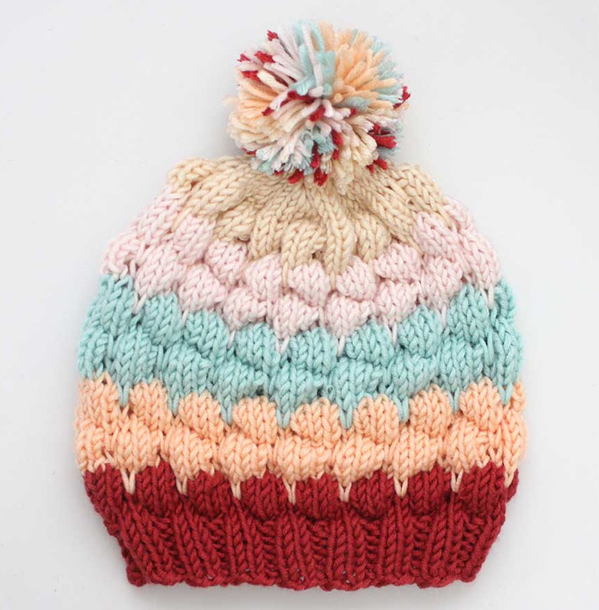 Bubble Beanie Hat - From casual to designer styled hats, these free knit hat patterns on circular needles are sure to be your new favorite projects to work on! #freeknithatpatterns #knithatpatterns #knitpatterns