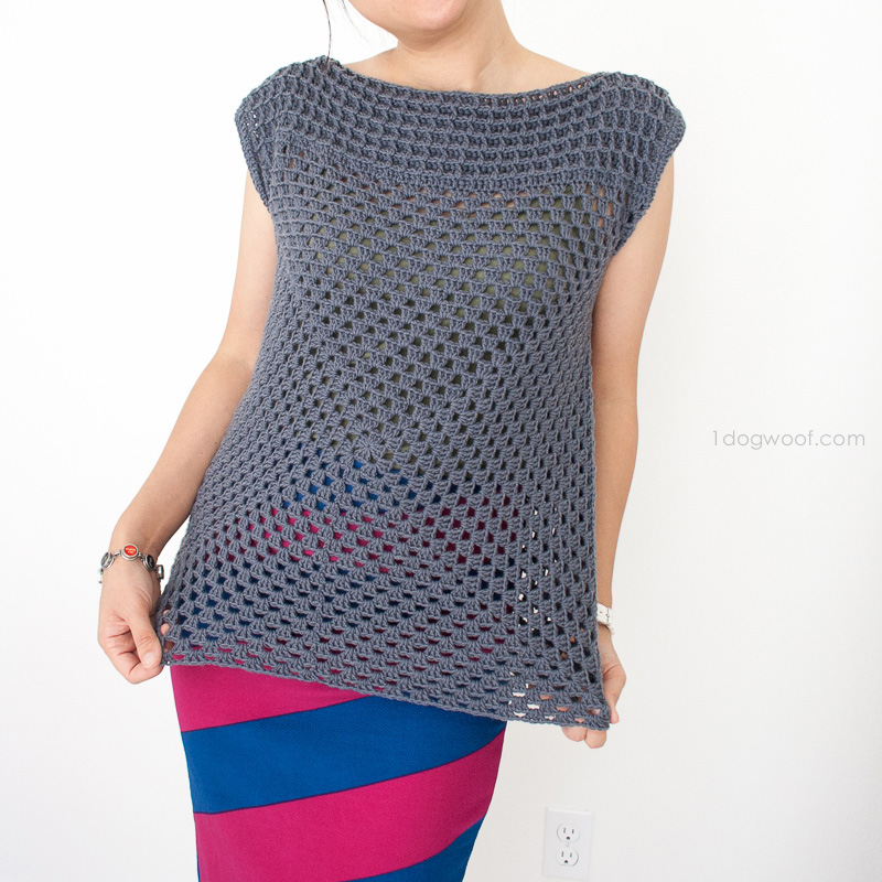 a woman wearing a granny squared crochet top