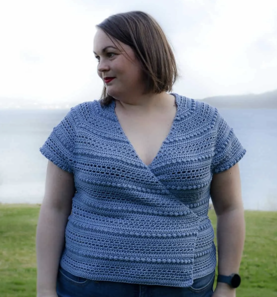a woman wearing the Sunshine Daydream Crochet Wrap Top