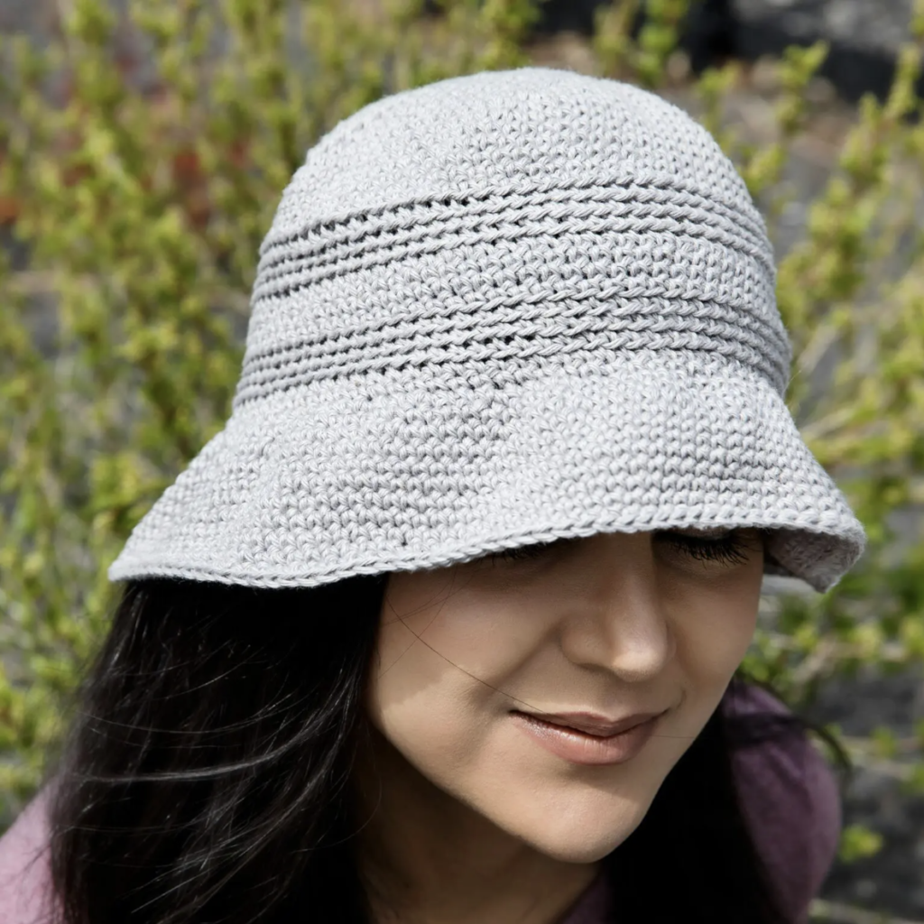 a woman wearing the Easy Weekend Bucket Hat
