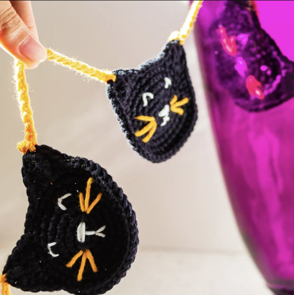 black crochet cat garland