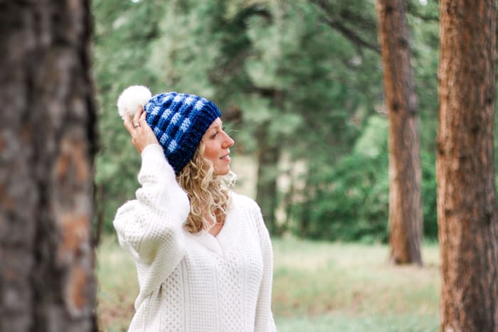 woman wearing plaid hat crochet