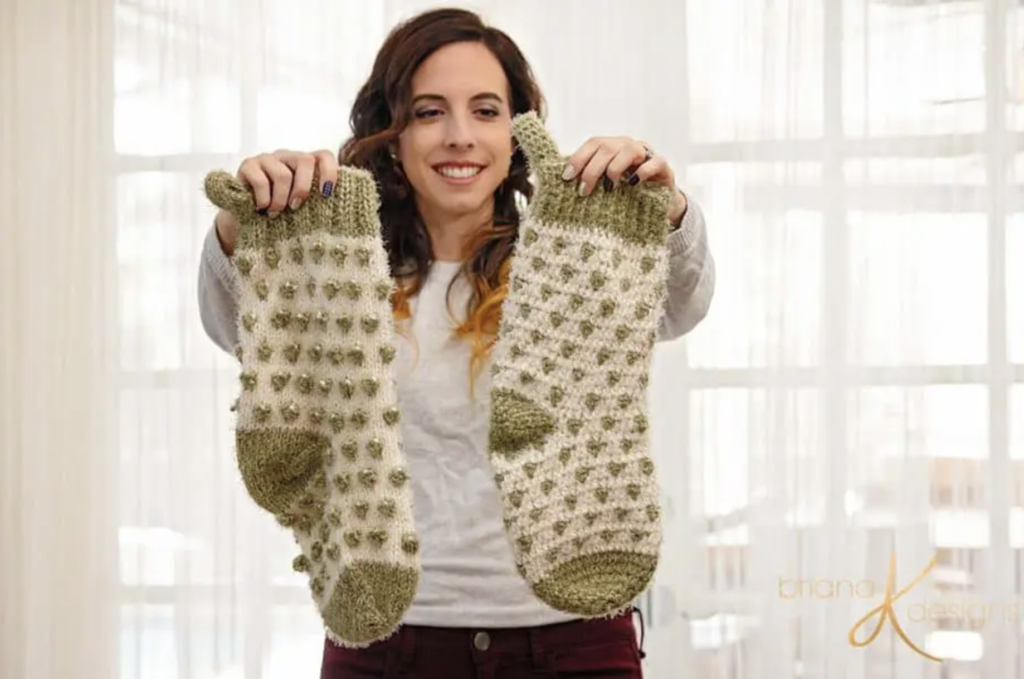 A woman holding a Polka Dot Crochet Stockings